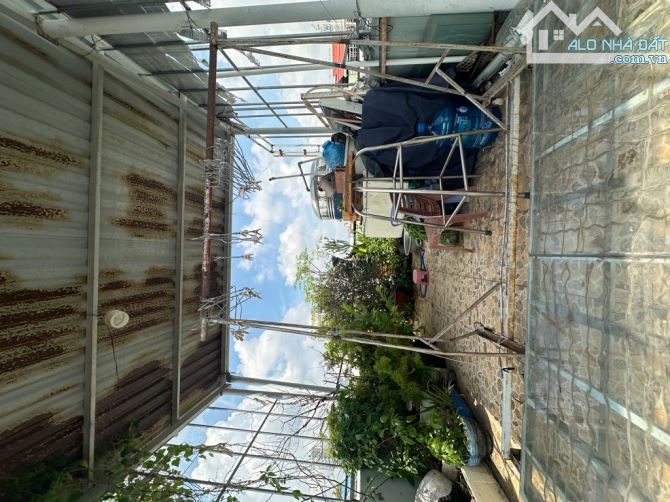 Nhà trung tâm Quận 4 – Vĩnh Khánh, 25m², 3PN, sân thượng – Sổ hồng riêng - 1