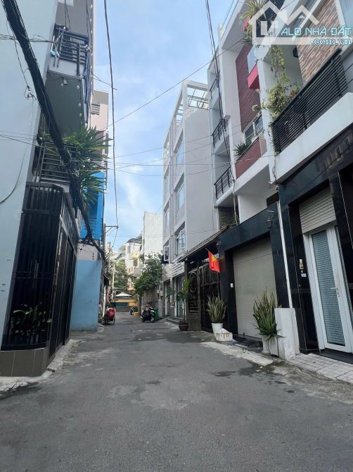 Căn góc 5 tầng. 9 phòng full nội thất (4,2x16m). Hẻm nhựa 6m gần mặt tiền Lê Văn Sỹ, Q3 - 1