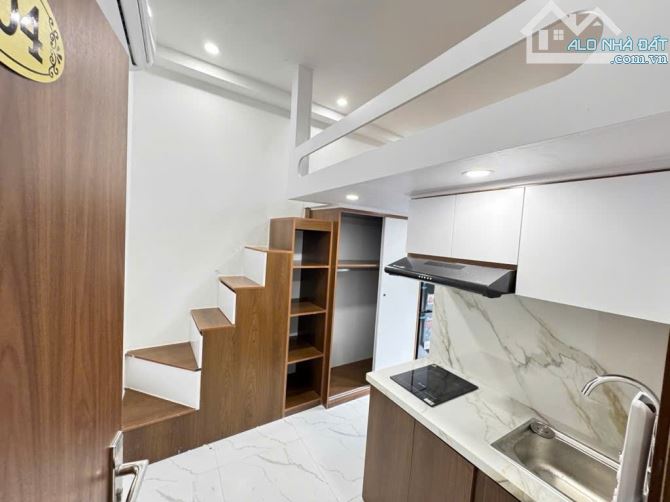 TÒA CCMN TẠI PHỐ LÊ QUANG ĐẠO, 80M2X7T, 27P DOANH THU CỰC CAO - 2