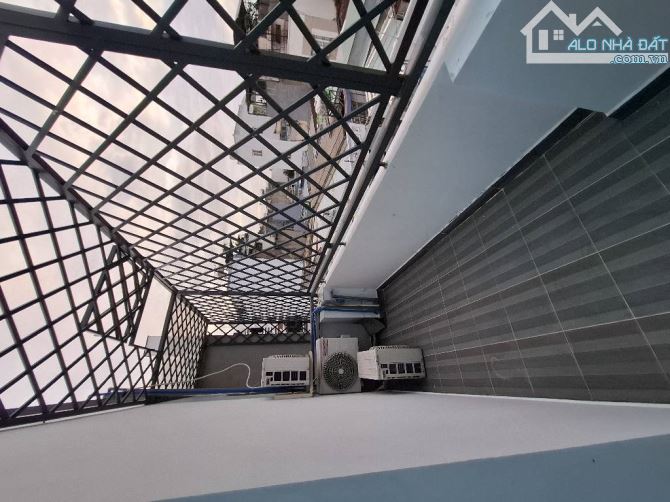 Nhà 4 tầng đúc BTCT hẻm 6m ô tô ngủ trong nhà giá 6 tỷ 890 đường Thống Nhất P16 Gò Vấp - 2