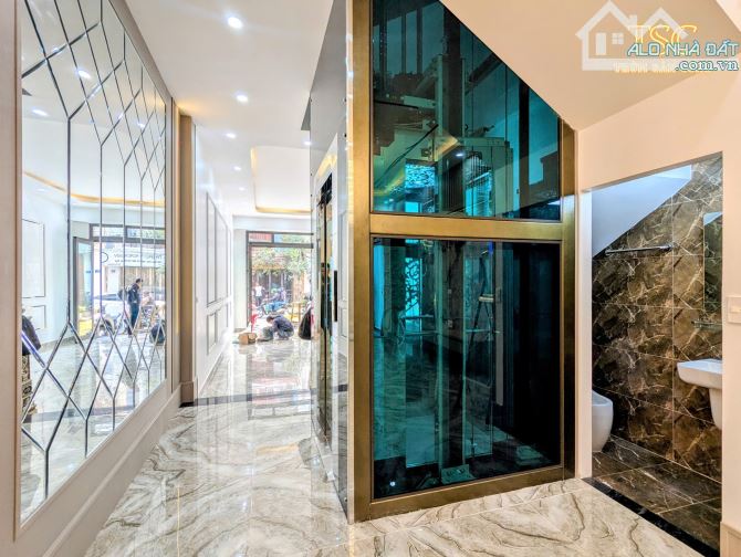 Nhà đẹp thang máy 5 tầng xây mới mặt đường Tô Vũ 193 Văn Cao - 3