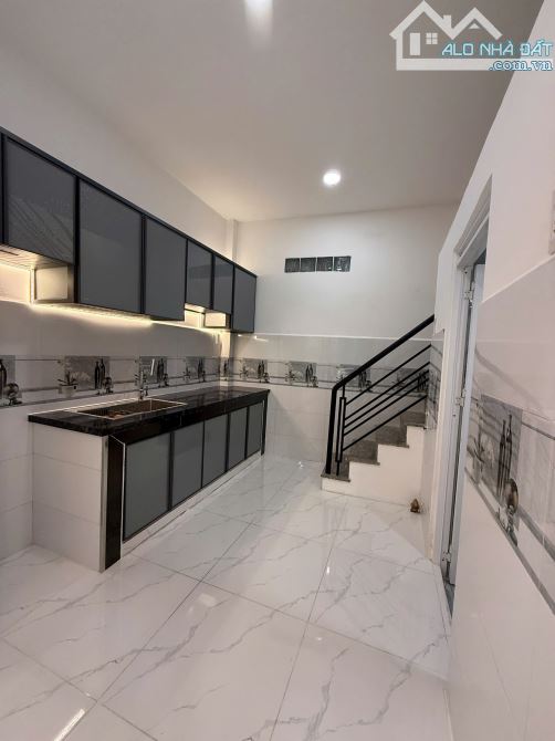 NHÀ MỚI 1 LẦU MỚI TINH ĐỐI DIỆN CHỢ BÌNH TIÊN Q.6 - 3