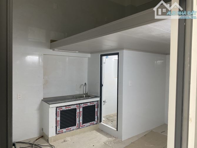Bán toà Căn Hộ Dịch Vụ DT 370m2 ngang 8m 2MT trước sau sát đường Lê Văn Việt - 6