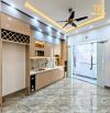 Nhà đẹp thang máy 5 tầng xây mới mặt đường Tô Vũ 193 Văn Cao