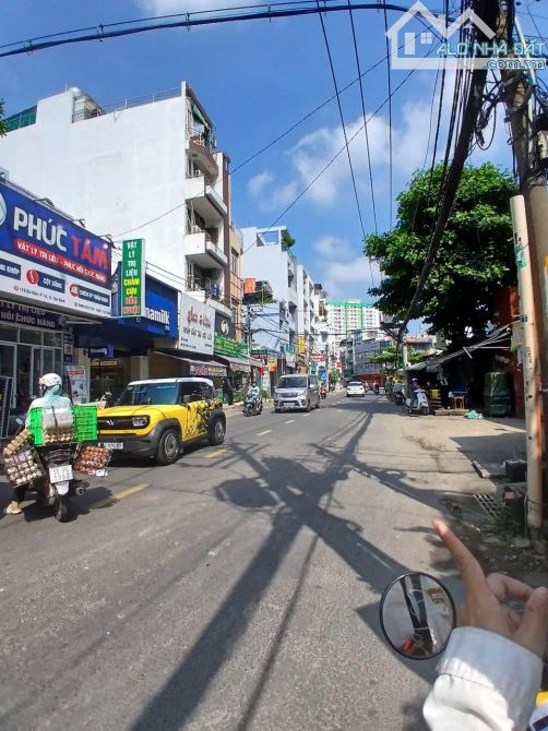 NHÀ MẶT TIỀN TRẦN HƯNG ĐẠO, QUẬN 1, DT: 4.1 X 16.5M, KC: 4 LẦU, HĐT: 85 TRIỆU, 31 TỶ