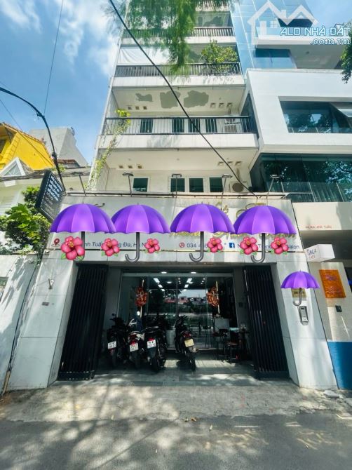 Bán gấp Nhà mặt phố VIP Đống Đa 70m 9 tầng mặt tiền 6.5m, trước nhà là công viên hồ 75 tỷ