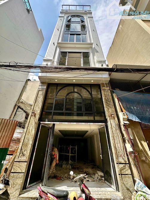 BÁN NHÀ TÔN ĐỨC THẮNG ĐỐNG ĐA 65m 8Tầng Mt 5.2m GIÁ 28 TỶ PHÂN LÔ THANG MÁY KINH DOANH.