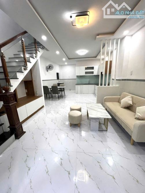 Bán nhà 1 trệt 1 lầu mới, hẻm thông đường 385 - Tăng Nhơn Phú A, Quận 9.