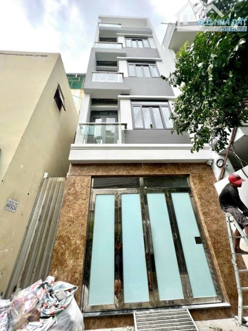 Nhà 5 tầng (5x20m), thua nhập 60tr/ tháng, sát Mặt tiền Bùi Minh Trực P5