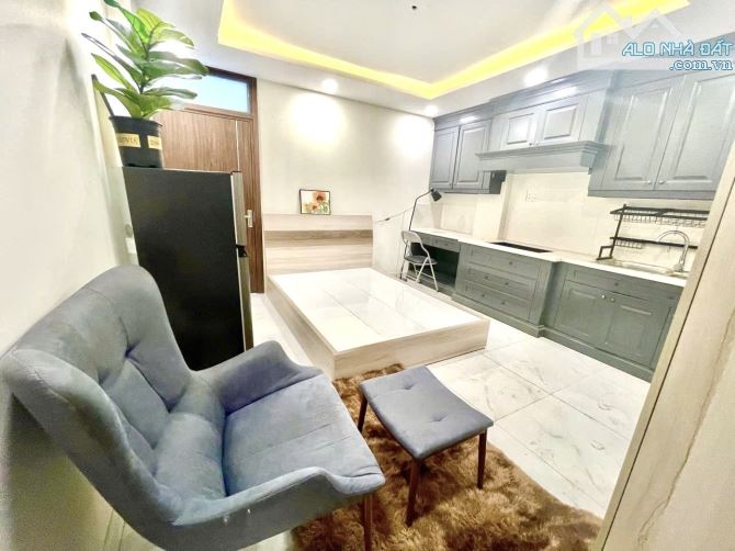 TÒA CHDV 5 TẦNG - 15 PHÒNG FULL NỘI THẤT - DOANH THU 88TR/THÁNG - GẦN SÂN BAY - DT 104m2