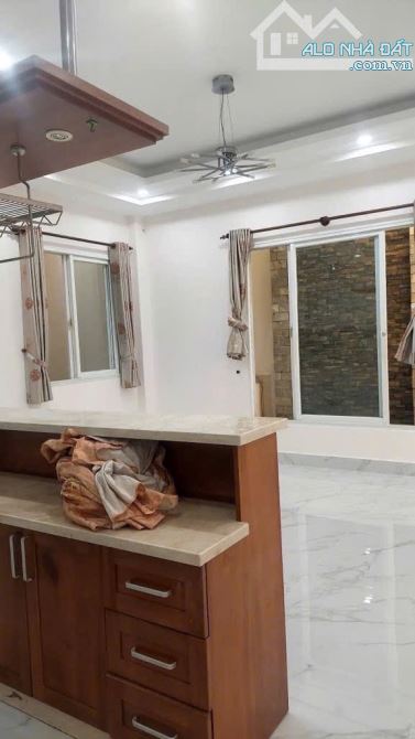 DÒNG TIỀN 360TR/NĂM Nhà 4 tầng,đường 12m đường LÊ ĐỨC THỌ phường 15, Q GÒ VẤP , DT 107,4m2 - 10