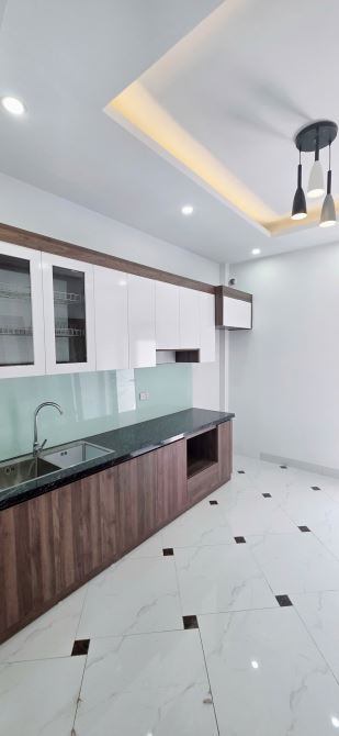 Nhà 4 tầng ngõ thông ô tô ngủ trong nhà,Mà giá chỉ nhỉnh 4 tỷ - 2