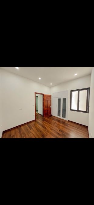 BÁN NHÀ PHỐ HOÀNG VĂN THÁI-VỊ TRÍ ĐẸP-2 THOÁNG-OTO CÁCH NHÀ 5m-THANG MÁY-6 TẦNG-51m-GIÁ 19 - 3