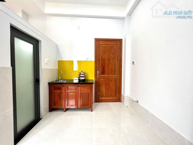 Nhà 5 tầng (5x20m), thua nhập 60tr/ tháng, sát Mặt tiền Bùi Minh Trực P5 - 4