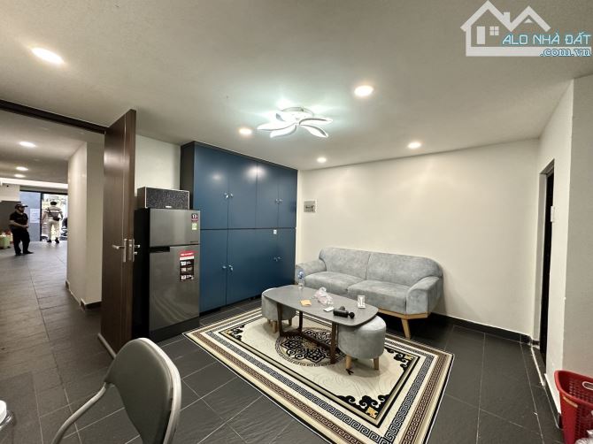 TÒA CHDV 5 TẦNG - 15 PHÒNG FULL NỘI THẤT - DOANH THU 88TR/THÁNG - GẦN SÂN BAY - DT 104m2 - 6
