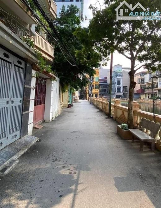 Bán Đất Tây Sơn quận Đống Đa 156m2 MT7,7m- Ngõ Ô Tô,View Hồ Xây Toà Dòng Tiền Cực Đẹp