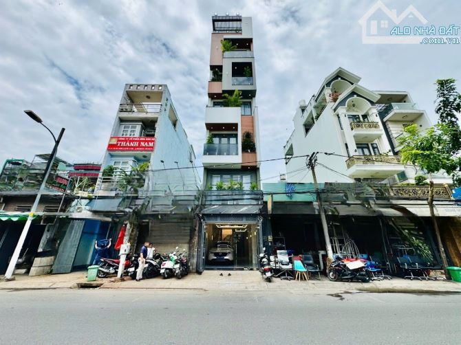 Bán nhà 549a Tân Sơn P12 Gò Vấp, DT 4x25m, 7 tầng thang máy. Giá 19,5 tỷ