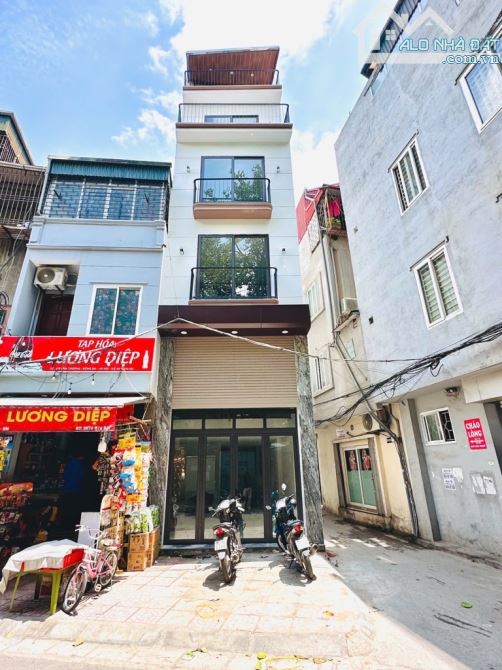 Víp Khâm Thiên oto tránh.38m.6 tầng thang máy.mt 3,6m.giá 18,8 tỷ.