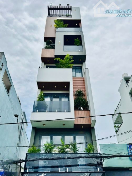Bán nhà 549a Tân Sơn P12 Gò Vấp, DT 4x25m, 7 tầng thang máy. Giá 19,5 tỷ - 1