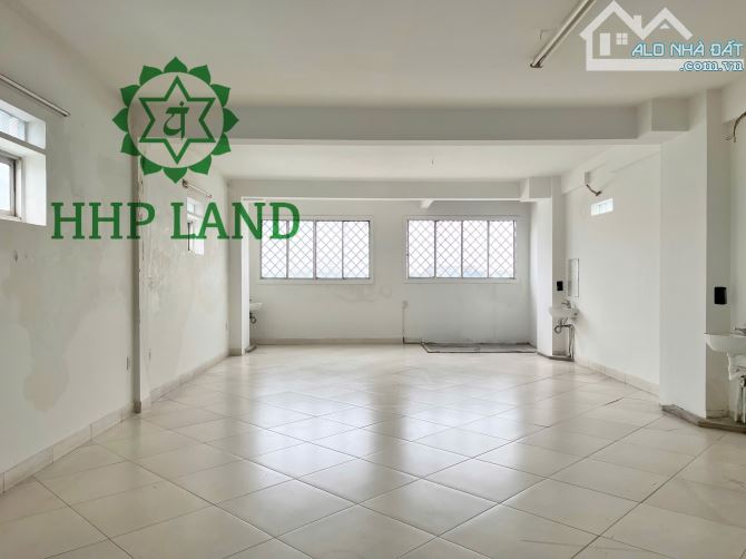 Cho thuê toà nhà 6 lầu có thang máy mặt tiền Quốc lộ 1A - 13