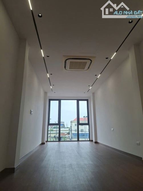 NHÀ MẶT PHỐ THANG MÁY VỈA HÈ 2 BÊN ĐƯỜNG TRƯỚC NHÀ 2 LÀN XE. - 4