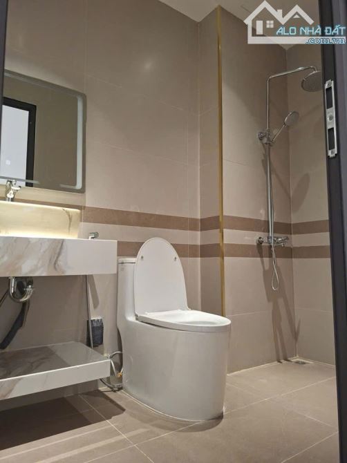 NHÀ MẶT PHỐ THANG MÁY VỈA HÈ 2 BÊN ĐƯỜNG TRƯỚC NHÀ 2 LÀN XE. - 5