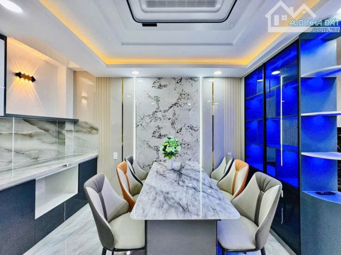 Bán nhà xây mới hẻm xe hơi 5m Bùi Quang Là, P.12, 3,8 x 13, 5 lầu giá 6.39 tỷ tl - 6