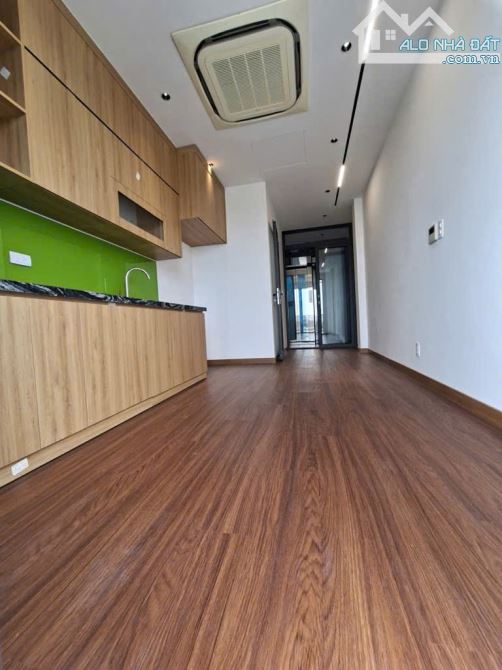 NHÀ MẶT PHỐ THANG MÁY VỈA HÈ 2 BÊN ĐƯỜNG TRƯỚC NHÀ 2 LÀN XE. - 7