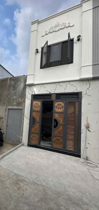 Nhà mới xây GIÁ 2T3 -Tỉnh Lộ 10 sát chợ Bà Hom, cách Nhi Đồng TP 12
