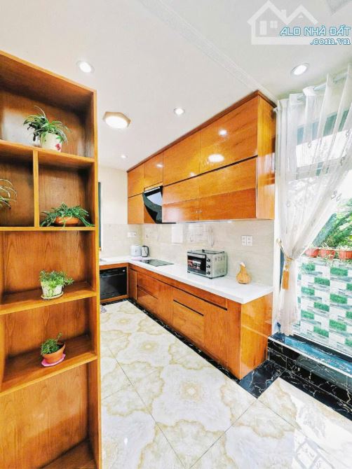 Khách Sạn 16 phòng Mặt Tiền, 405 đường Nguyễn Văn Trỗi, P.02, 2 hầm, 1 trệt, 2 lầu, áp mái - 1