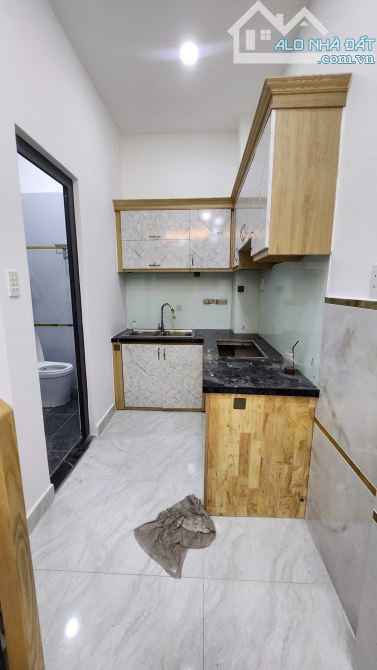 Nhà mới xây GIÁ 2T3 -Tỉnh Lộ 10 sát chợ Bà Hom, cách Nhi Đồng TP 12