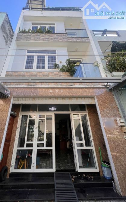 Nhà 4 tầng 56m² hẻm xe hơi Đình Phong Phú – giá 6.3 tỷ TL