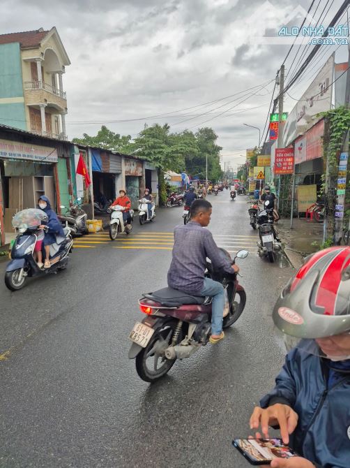 Bán Nhà mặt tiền Buôn Bán Ngay chợ an nhơn - Ngã tư chiêu liêu Tân đông hiệp dĩ an 6 tỷ 5 - 12