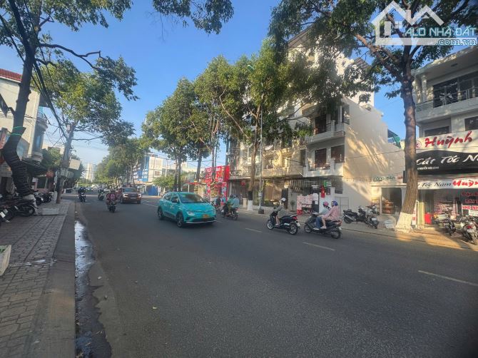 BÁN ĐẤT TẶNG NHÀ 3 TẦNG ĐƯỜNG NGUYỄN ĐỨC CẢNH , CHIỀU NGANG 9,7m , THU NHẬP 30 TRIỆU / THÁ - 2