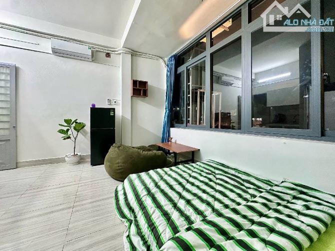 SIÊU PHẨM CHDV 18 PHÒNG 6 TẦNG ĐÚC - HXH 98M2  DÒNG TIỀN 100TR/TH NGAY LÊ VĂN THỌ 17.8 TỶ - 2