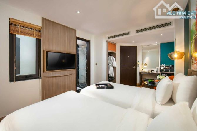 Bán khách sạn MP Nguyễn Trường Tộ 180m2 x16 tầng MT 7.5m, Giá 165 tỷ - doanh thu 35 tỷ/năm - 7