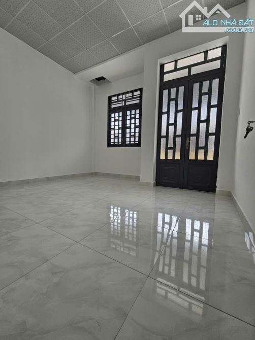 Bán nhà sổ hồng riêng DT 100m2 1 trệt 1 lầu - 1