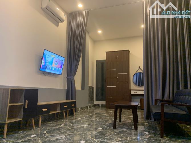Cần bán tòa căn hộ 5 tầng, 2 mt trước sau đường Hồ Phi Tích và Đinh Văn Chấp, Hòa Xuân - 1