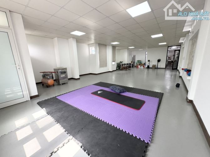 BÁN NHÀ LÔ GÓC 2 MẶT TIỀN Ô TÔ TRÁNH HUỲNH THÚC KHÁNG 75M2 - 6 TẦNG - 9M MẶT TIỀN - HIẾM - 2