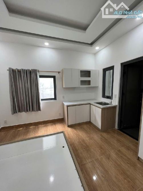 TÒA NHÀ LỚN-DT RỘNG DÒNG TIỀN CAO GIÁ TỐT-BÁN NHÀ CHDV 5.5X23-5TẦNG NGUYỄN THÁI BÌNH TÂN - 2