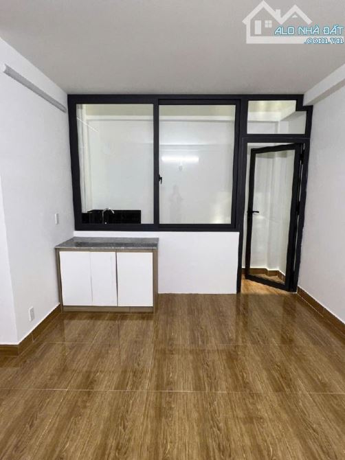 TÒA NHÀ LỚN-DT RỘNG DÒNG TIỀN CAO GIÁ TỐT-BÁN NHÀ CHDV 5.5X23-5TẦNG NGUYỄN THÁI BÌNH TÂN - 3