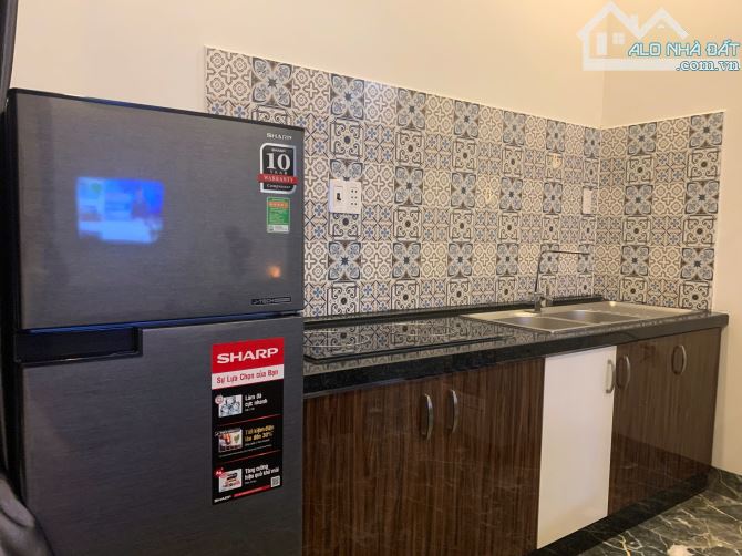 Cần bán tòa căn hộ 5 tầng, 2 mt trước sau đường Hồ Phi Tích và Đinh Văn Chấp, Hòa Xuân - 7