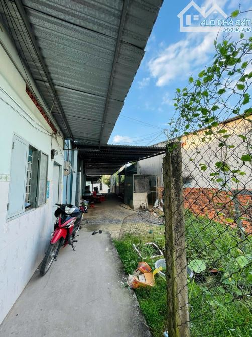 Cần bán nhà 1 lầu 1 trệt 6 phòng trọ đường số 15 1/ Trần Tử Bình xã Tân Thông Hội 9x42 Ful - 1