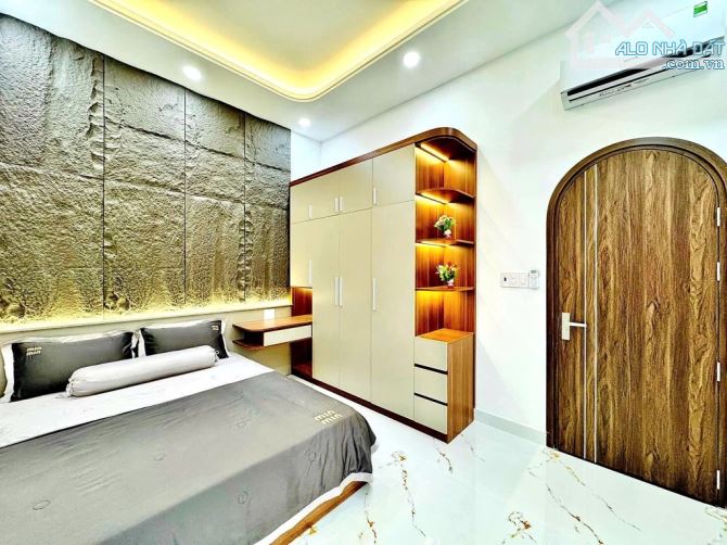 Nhà mặt tiền quận Gò Vấp 42m2 giá 6 tỷ 280 đường 10m kinh doanh đa ngành đường số 8 P11 - 1