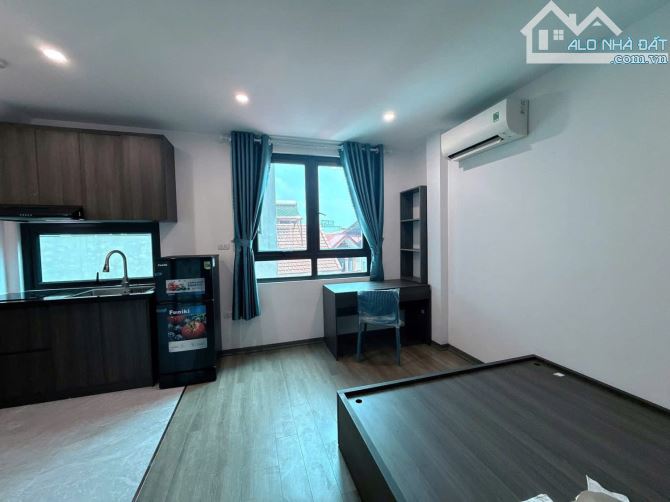 Bán tòa CCMN Cầu Giấy 7 tầng thang máy, 14 phòng KK, Lô góc, ô tô đỗ cửa DT 73m 28 tỷ - 1