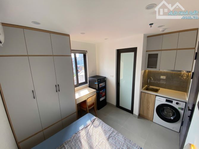 Bán toà CHDV 64m2*6T thang máy 14PN gần ĐH KTQD DT 1 tỷ/năm, gần oto, PCCC đủ - 2