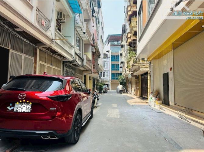 BÁN NHÀ NGUYỄN PHONG SẮC 65m2 × 7T THANG MÁY - GARA 2 Ô TÔ, 2 Ô TÔ TRÁNH + HAI THOÁNG