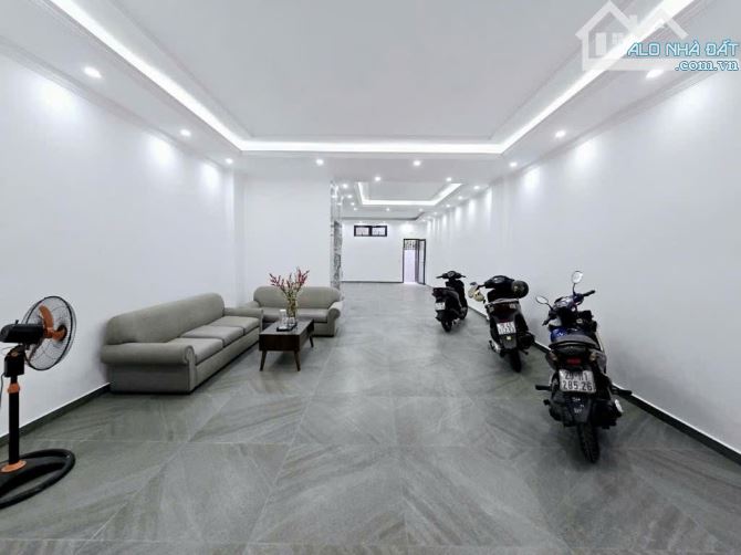 BÁN NHÀ NGUYỄN PHONG SẮC 65m2 × 7T THANG MÁY - GARA 2 Ô TÔ, 2 Ô TÔ TRÁNH + HAI THOÁNG - 1