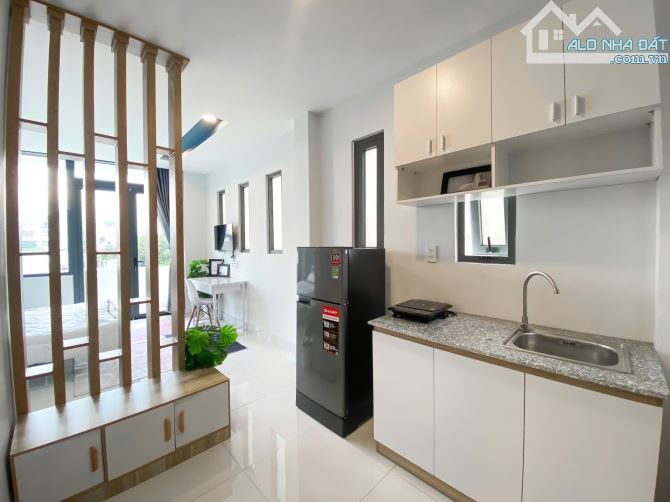 Mặt tiền khu Phan Xích Long, Phú Nhuận, 5 tầng, 9 phòng, dòng tiền 45tr/tháng - 1