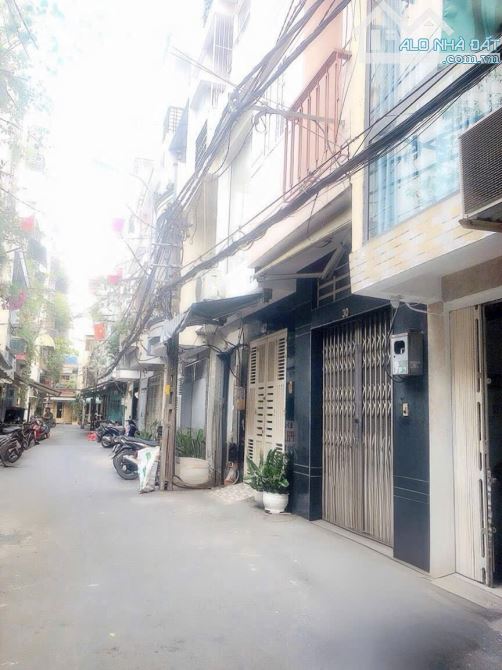 MT đường số - 4 tầng - 21m2 - Xe hơi đỗ cửa -Vĩnh Hội Q4. - 1